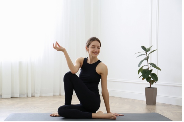 Ardha matsyendrasana (half lord of the fishes pose)